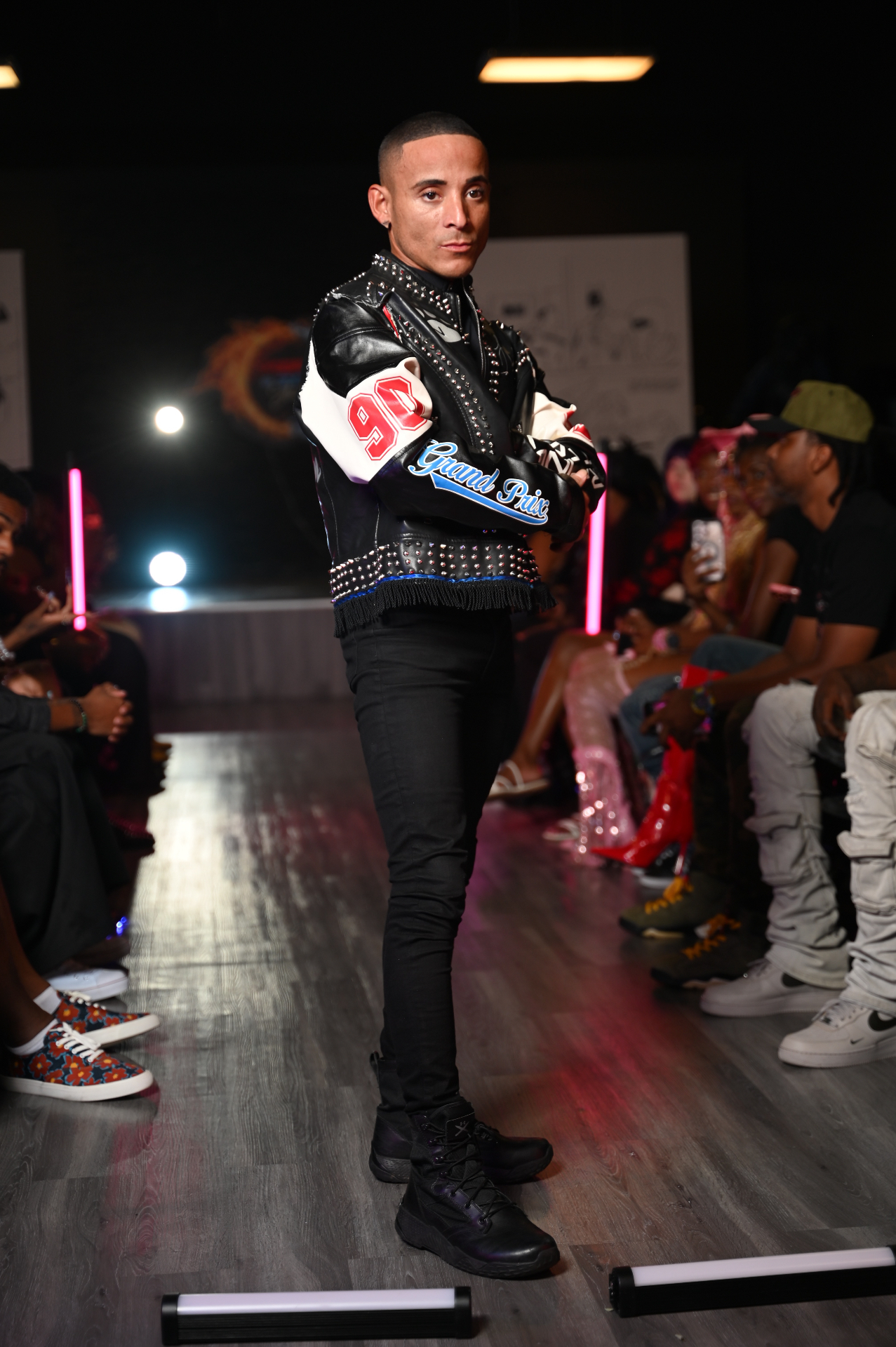 Alante on the Across The Multiverse runway in a black studded Grand Prix jacket