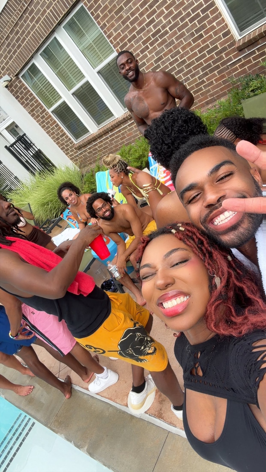 OctaveATL pool party group shot — Atlanta anime social club crew turnt poolside